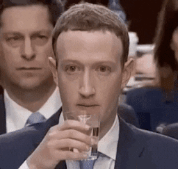 Mark Zuckerberg awkwardly drinks water