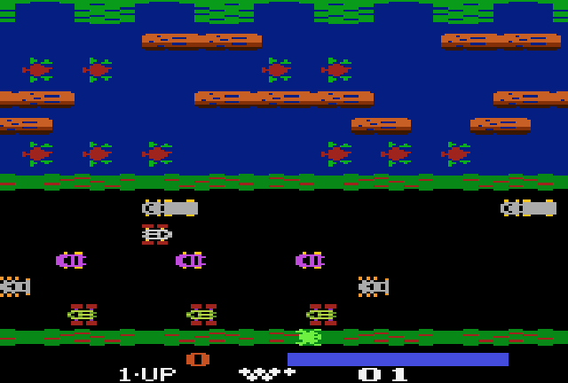 a screenshot of the Atari 2600 classic, Frogger, in which a pixelated frog needs to safely cross a busy road and an alligator infested swamp to get home