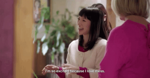 Marie Kondo talking to another person and saying "I'm so excited because I love mess"