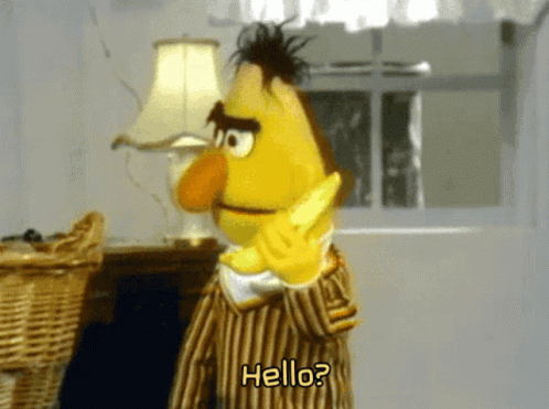 Bert answering a banana and saying "Hello?"
